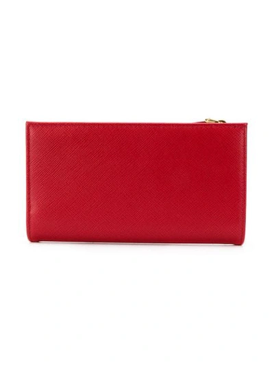 Shop Prada Saffiano Slim Wallet In Red