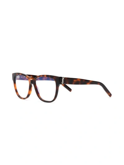 Shop Saint Laurent Oval Shaped Glasses In Brown