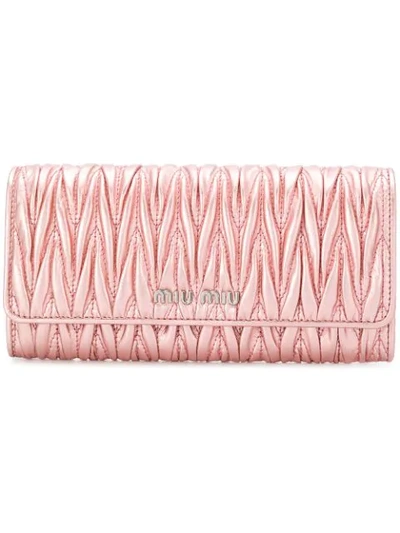 Shop Miu Miu Matelassé Flap Wallet - Pink