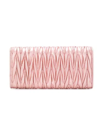 Shop Miu Miu Matelassé Flap Wallet - Pink