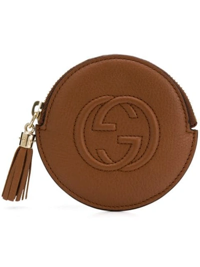Shop Gucci Gg Embossed Circular Purse - Brown