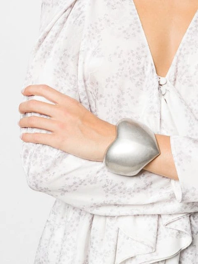 Shop Saint Laurent Heart-shaped Cuff In Silver