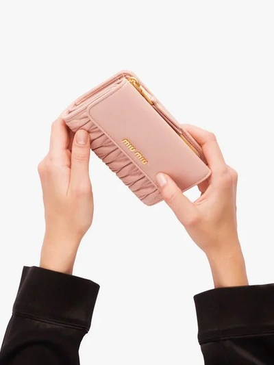 Shop Miu Miu Matelassé Flap Wallet In Pink