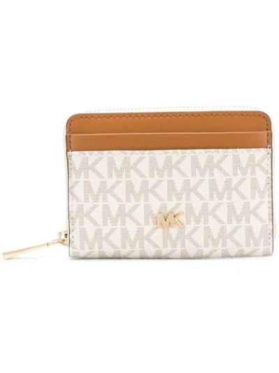 Shop Michael Michael Kors Monogram Zipped Wallet In Neutrals