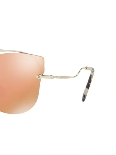 Shop Miu Miu Scenique Sunglasses In Gold