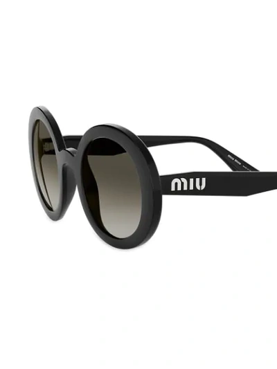 Shop Miu Miu Oversized Round-frame Sunglasses In Black