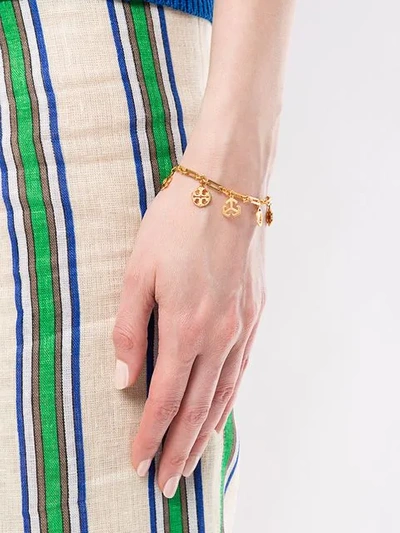 Shop Tory Burch Logo Charm Bracelet In Gold