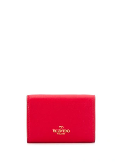 Shop Valentino Garavani Small Rockstud Wallet - Red