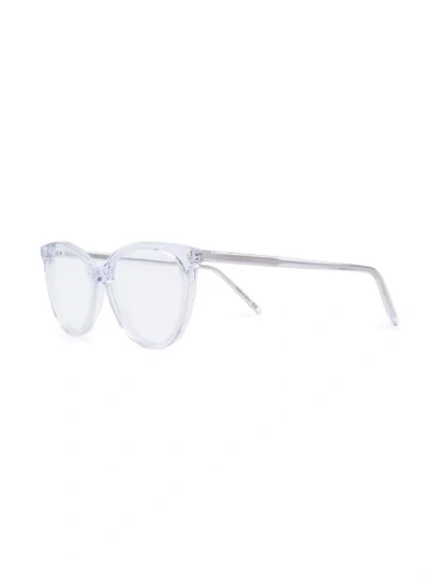 Shop Saint Laurent Transparent Frame Glasses In Neutrals