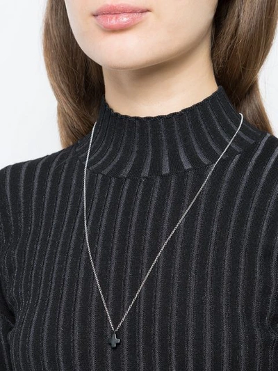 Shop Hues Mini Cross Pendant Necklace In Metallic ,black