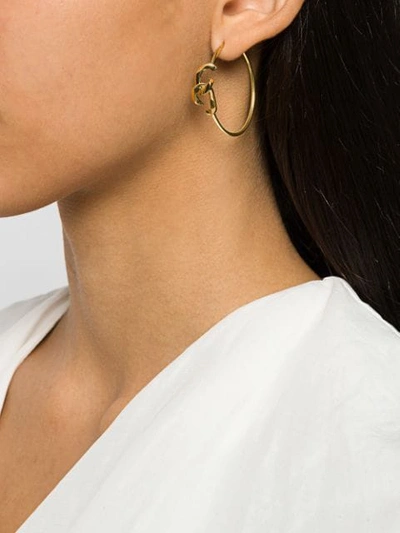 Shop Annelise Michelson Tiny Dechainee Small Hoops In Gold