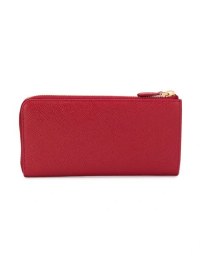 Shop Prada Zip Around Logo Wallet In Red