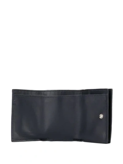 Shop Saint Laurent Small Embossed Wallet - Black