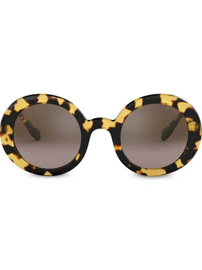 Shop Miu Miu Round Frame Sunglasses In Brown