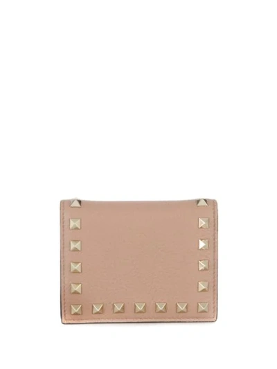 Shop Valentino Rockstud Wallet In Neutrals