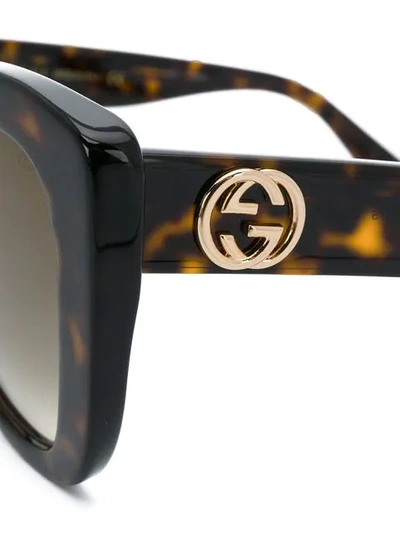 Shop Gucci Tortoiseshell-effect Sunglasses In Brown