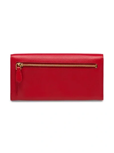 Shop Prada Large Saffiano Leather Wallet In Red