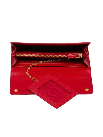 Shop Prada Large Saffiano Leather Wallet In Red