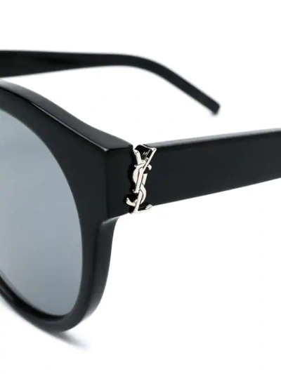 Shop Saint Laurent Round Frame Sunglasses In Black