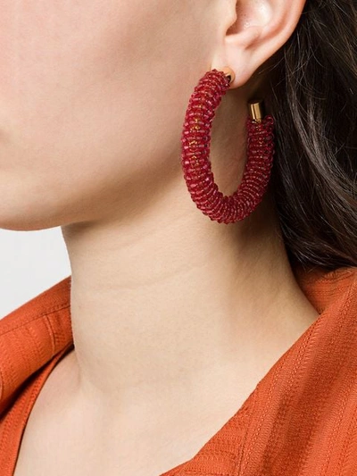 Shop Jacquemus Beaded Hoop Earrings In Pink