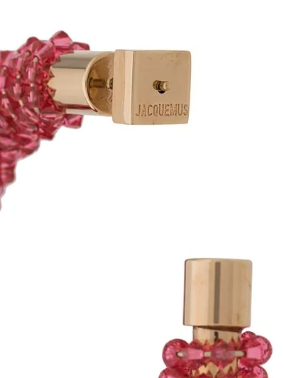 Shop Jacquemus Beaded Hoop Earrings In Pink