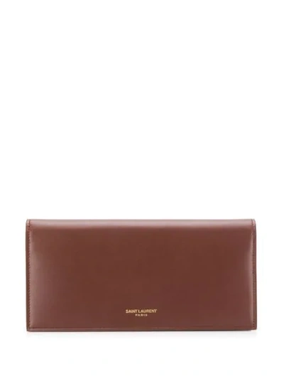 Shop Saint Laurent Logo Stamp Continental Wallet In Brown