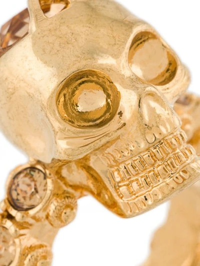 Shop Alexander Mcqueen Skull Ring In Metallic