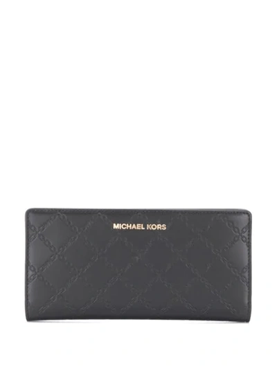 Shop Michael Michael Kors Embossed Logo Wallet In Black