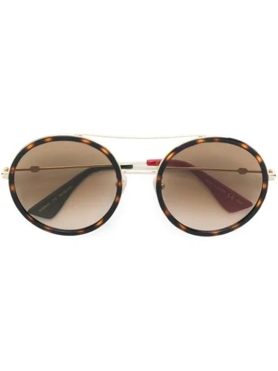 Shop Gucci Round Sunglasses In Brown