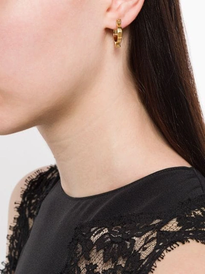 Shop Annelise Michelson Extra Small Alpha Earrings In Gold