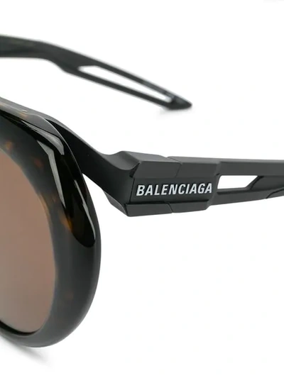 Shop Balenciaga Round Frame Sunglasses In Brown