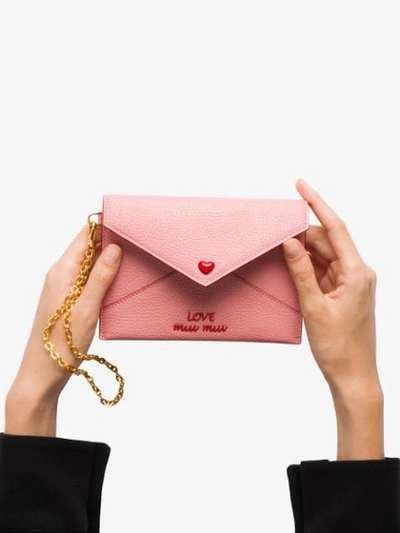 Shop Miu Miu Love Logo Envelope Pouch In Pink