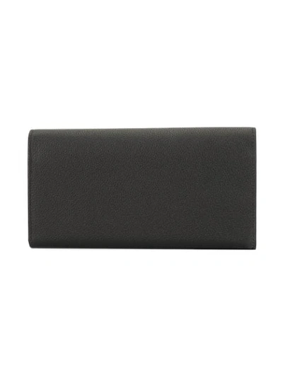 Shop Tod's Flap Wallet In Black