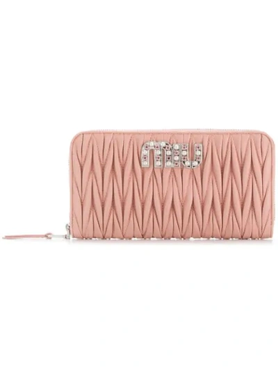Shop Miu Miu Matelassé Zipped Wallet In Pink
