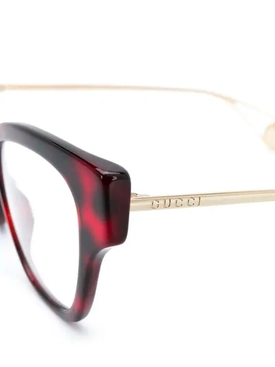 Shop Gucci Cat Eye Frame Glasses In Gold