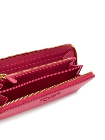 Shop Prada Logo-plaque Zipped Wallet In Pink