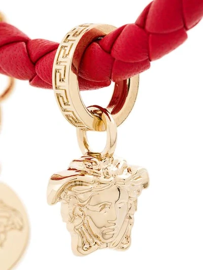 Shop Versace Woven Charm Bracelet In Red