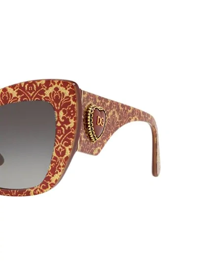 Shop Dolce & Gabbana Cat-eye Tinted Sunglasses In Red