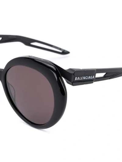 Shop Balenciaga Hybrid Round-frame Sunglasses In Black