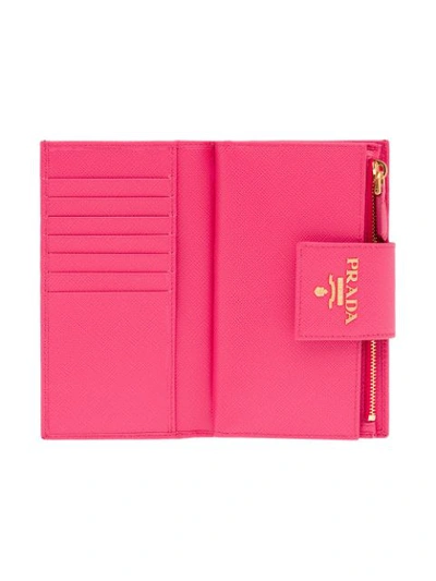Shop Prada Medium Saffiano Wallet In Pink