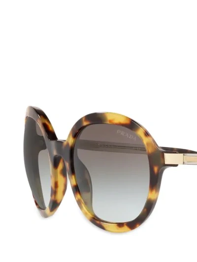 Shop Prada Heritage Round Frame Sunglasses In Black