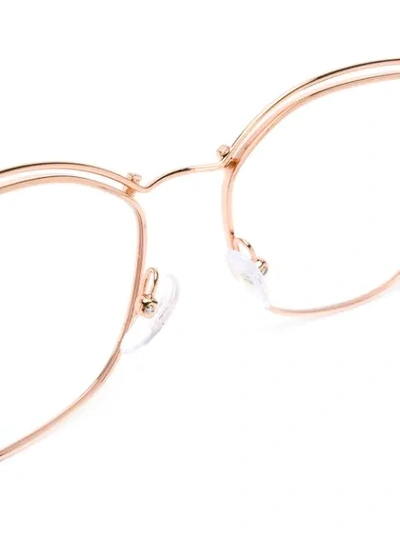 Shop Prada Eyewear Cat-eyed Frame Glasses - Metallic