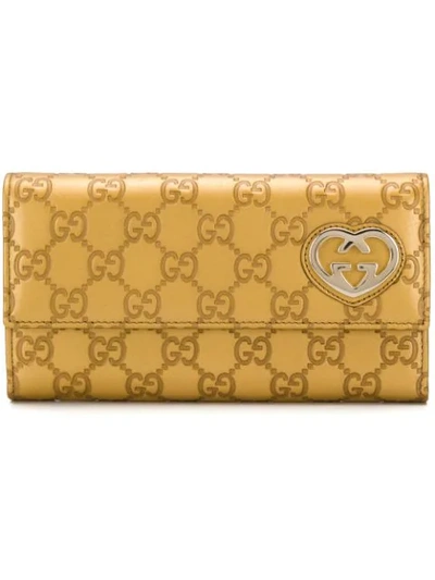 Shop Gucci Gg Motif Wallet In Gold
