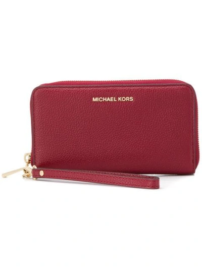 Shop Michael Michael Kors Mercer Smartphone Wristlet In Red