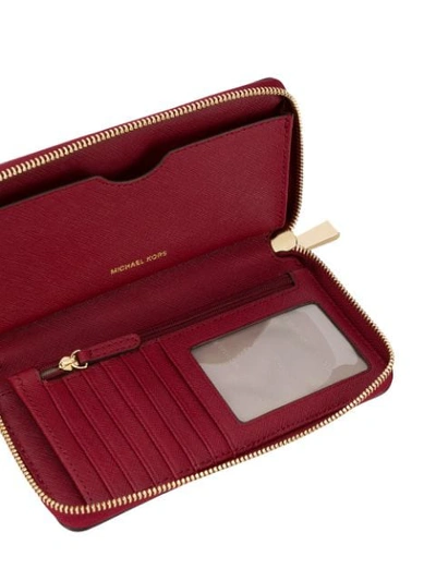 Shop Michael Michael Kors Mercer Smartphone Wristlet In Red