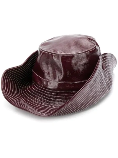 Shop Ganni Patent Bucket Hat In 431 Port Royale