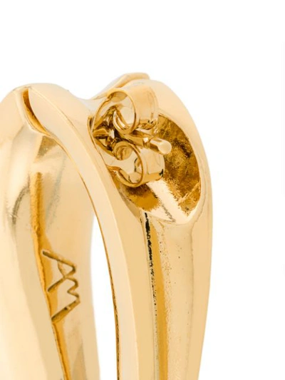 Shop Annelise Michelson Medium Heels Earrings - Gold