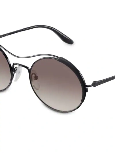 Shop Prada Round Frame Sunglasses In Black