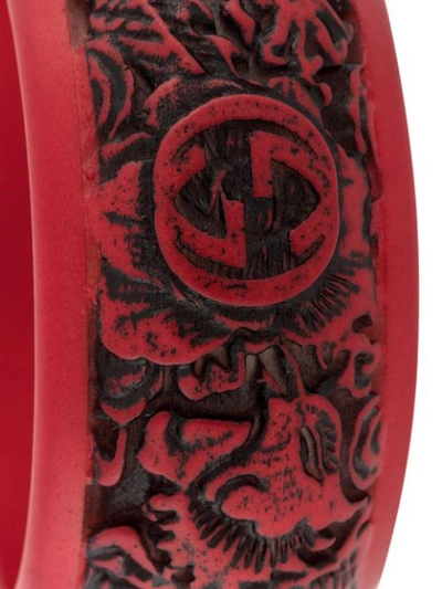 Shop Gucci Logo Carved Bangle In Red