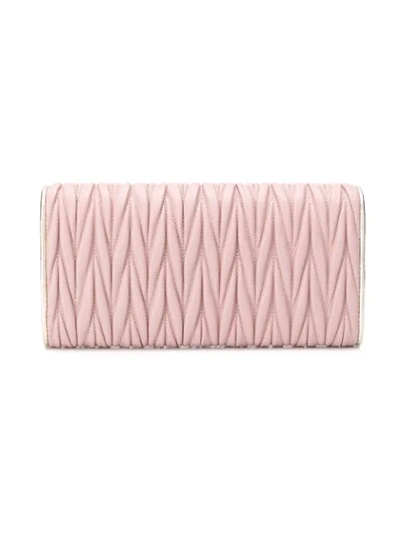 Shop Miu Miu Matelassé Foldover Wallet In Pink